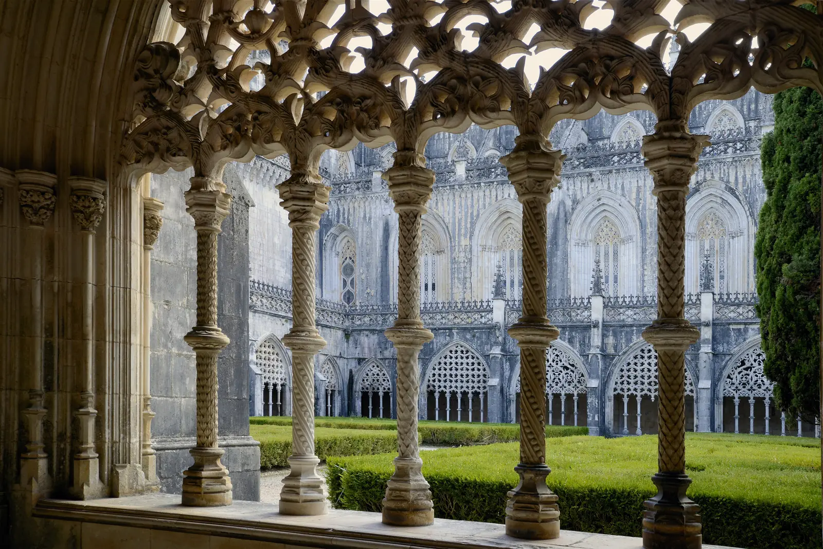 Carved stone tracery framing the Royal Cloister of the Monastery of Batalha