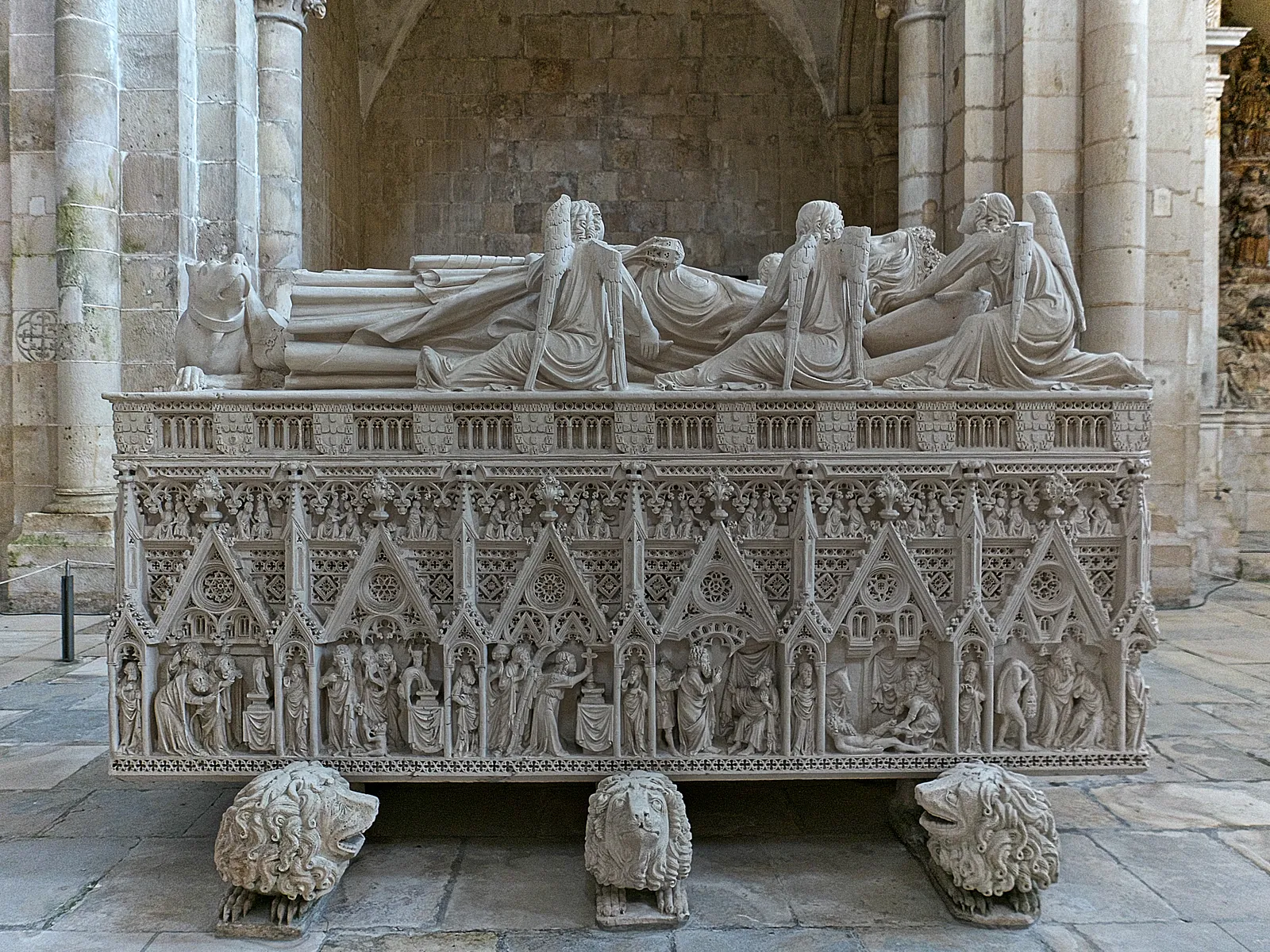 The Gothic tomb of King Pedro I in Alcobaça Monastery, richly carved and resting on sculpted lions